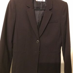 This is a Tahari jacket has only been used once